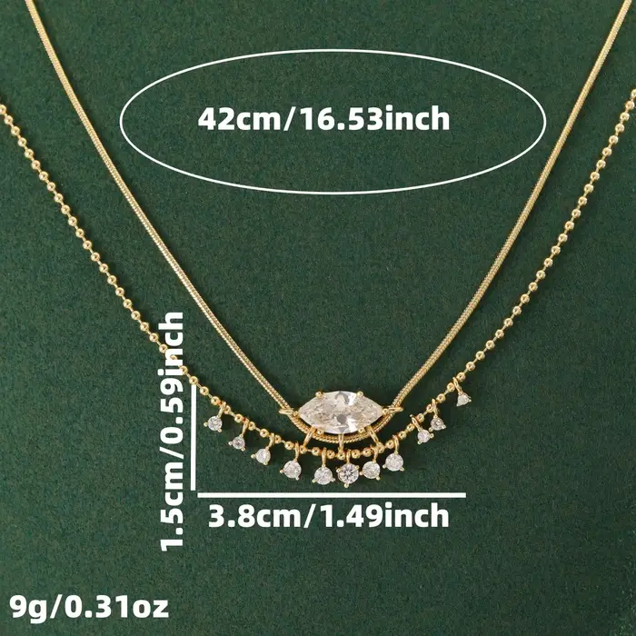 Collier de luxe en cuivre pour femmes avec pierres précieuses artificielles de forme marquise et design à pompon, idéal pour les mariages et les banquets.