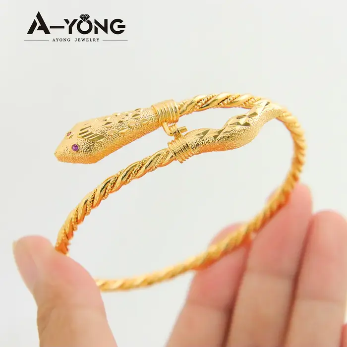 Bracelet torsadé serpent mode arabe plaqué or 21 carats